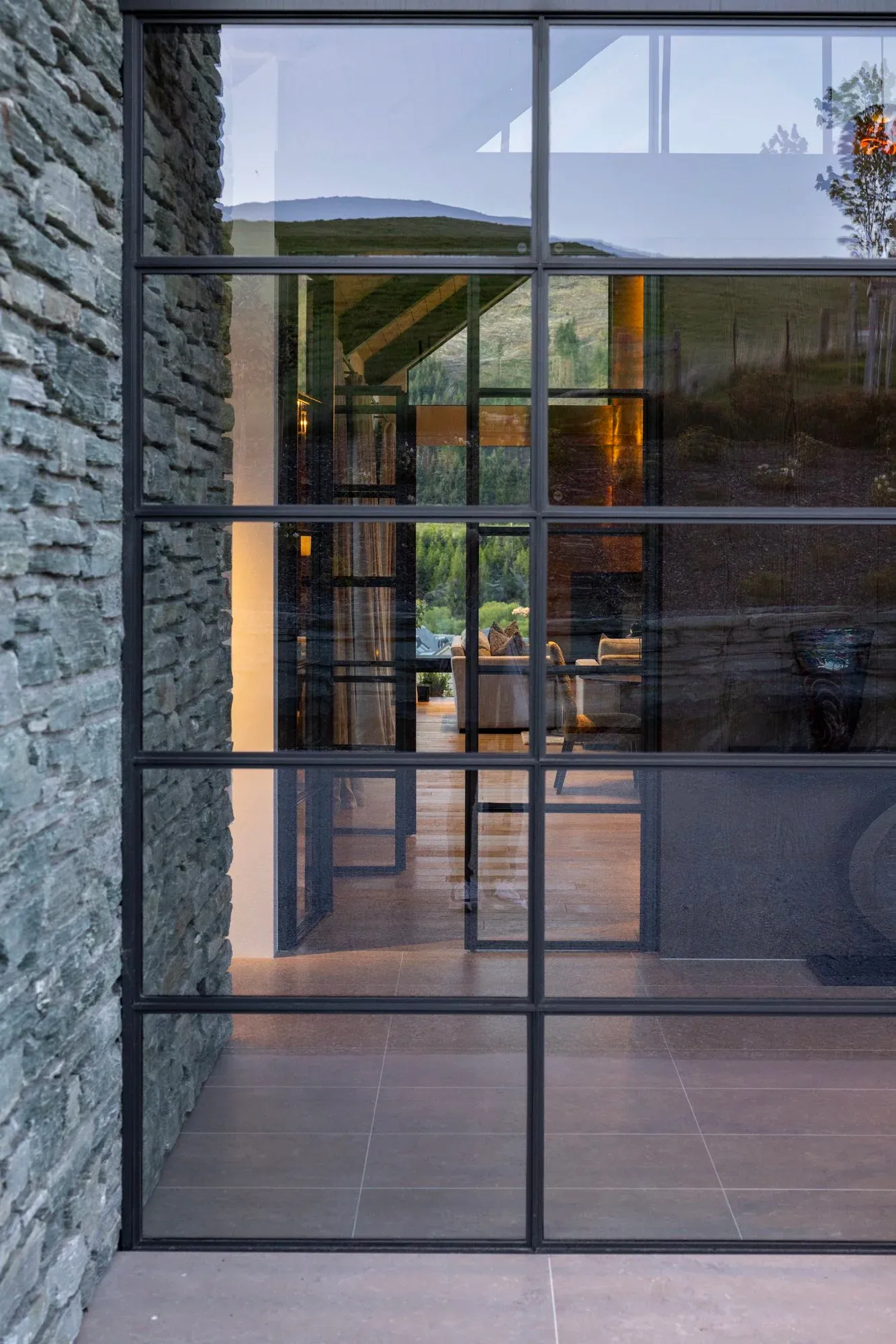 Ploughman’s Lane — Lakeside home with sliding doors and a thermally-broken envelope